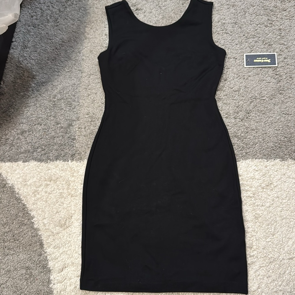 NWT Black dress by Juicy Couture, the zip on the back, and stretch.